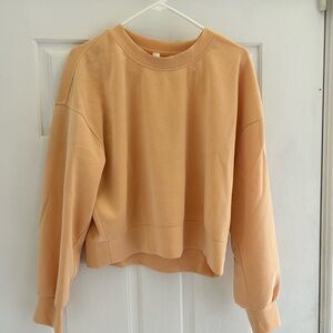 Lululemon Softstreme crewneck pullover in color Peach Bellini